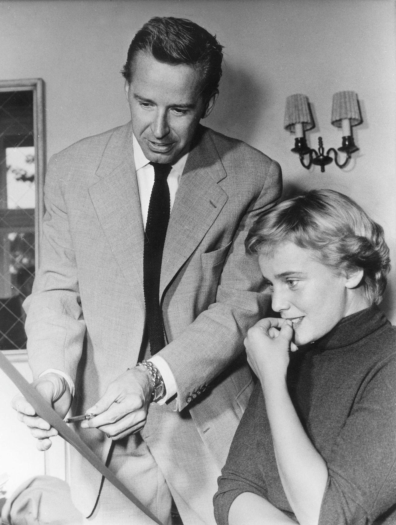 Maria Schell With Fashion Designer Heinz Oestergaard, Who Designed Costumes For 'Herr Ueber Leben Und Tod', 1954.
