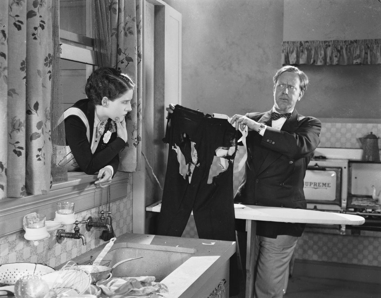 Robert Z Leonard Holding Up Trousers For Norma Shearer During Filming, April 27, 1926.