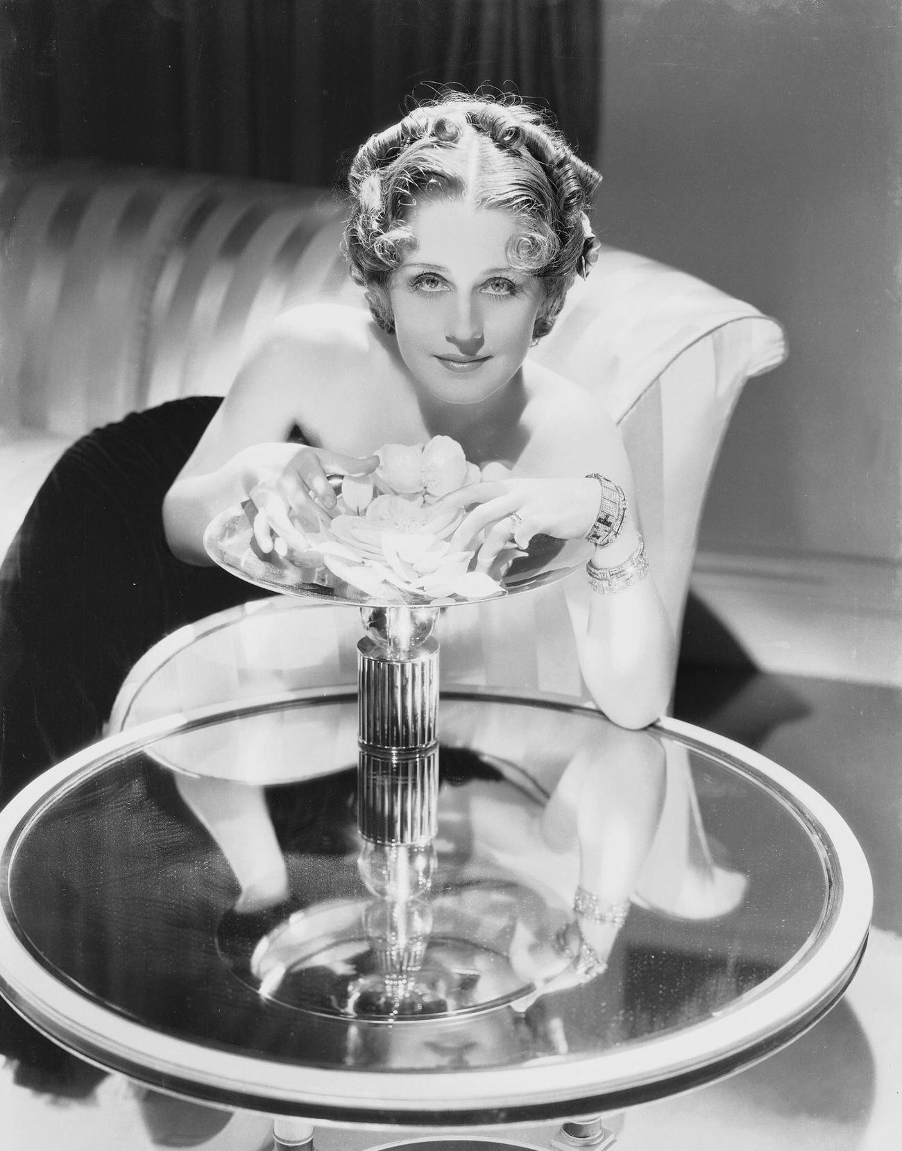 Norma Shearer Arranging Cocktail Snacks, Circa 1930.