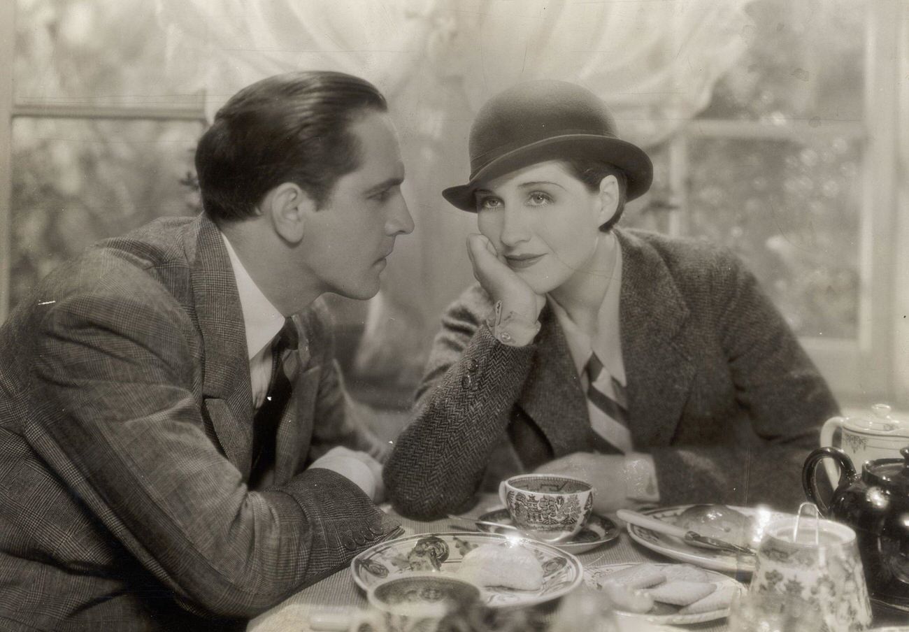 Norma Shearer And Fredric March In Mgm'S 1932 &Amp;Quot;Smilin' Through,&Amp;Quot; Seated Over Tea And Biscuits.