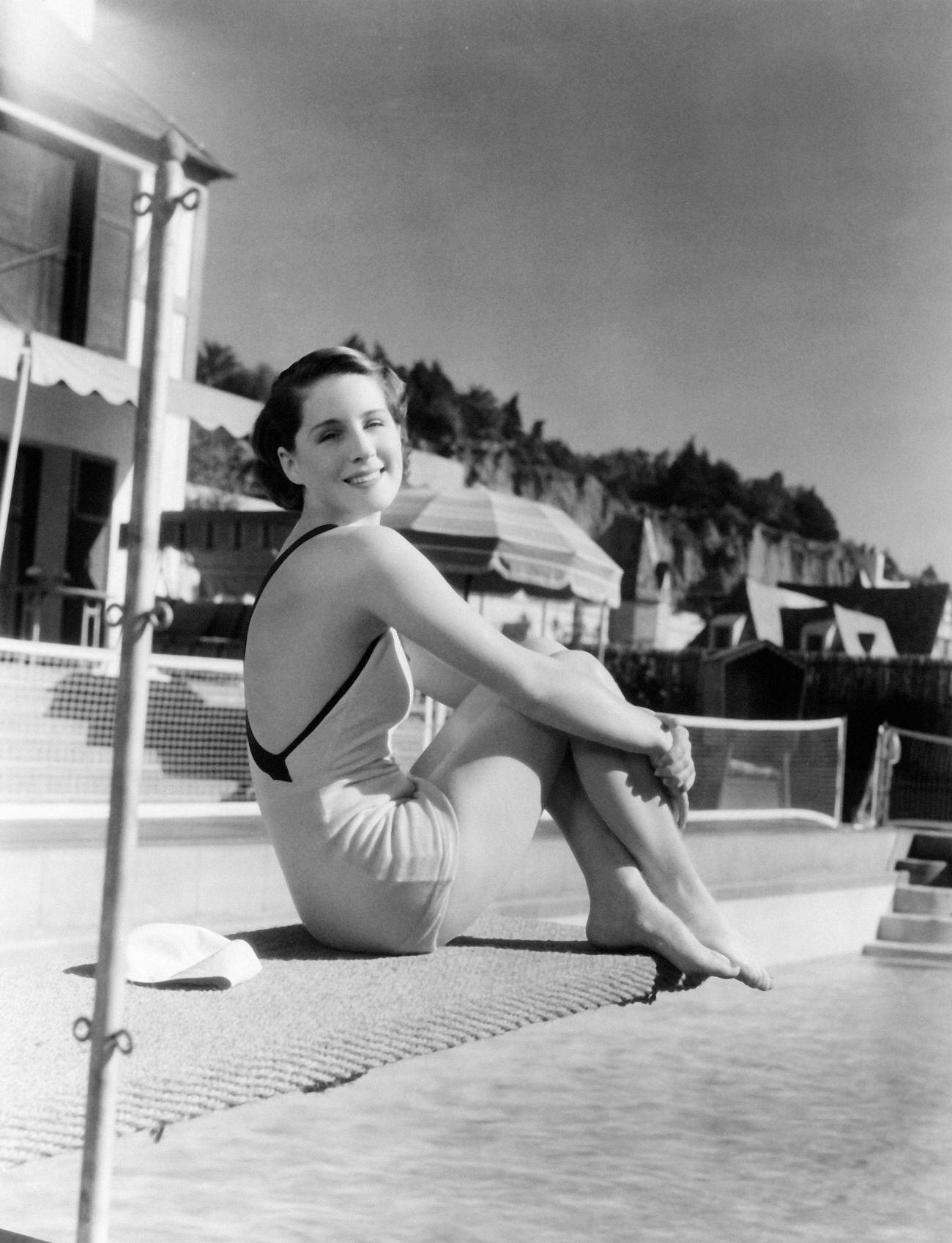 Norma Shearer Posing By The Swimming Pool Of Her Hollywood Home, Circa 1930.