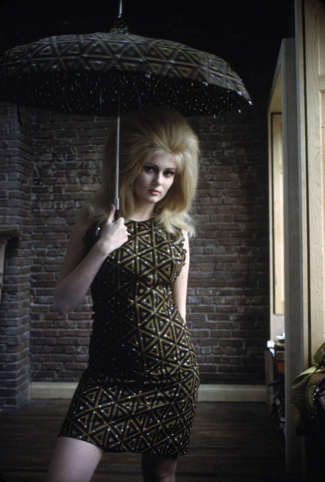 Pamela Tiffin Poses In A Green And Black Dress With A Matching Umbrella, April 1966.