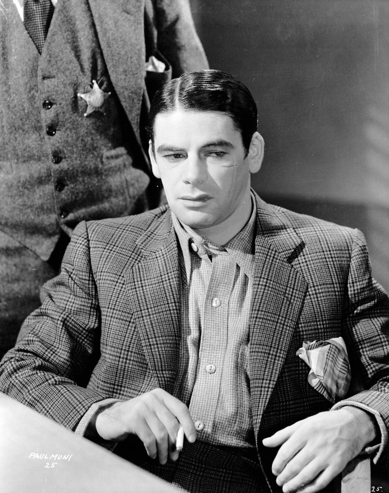 Paul Muni As Tony Camonte In 'Scarface', With A Man Wearing A Sheriff'S Badge, 1932.
