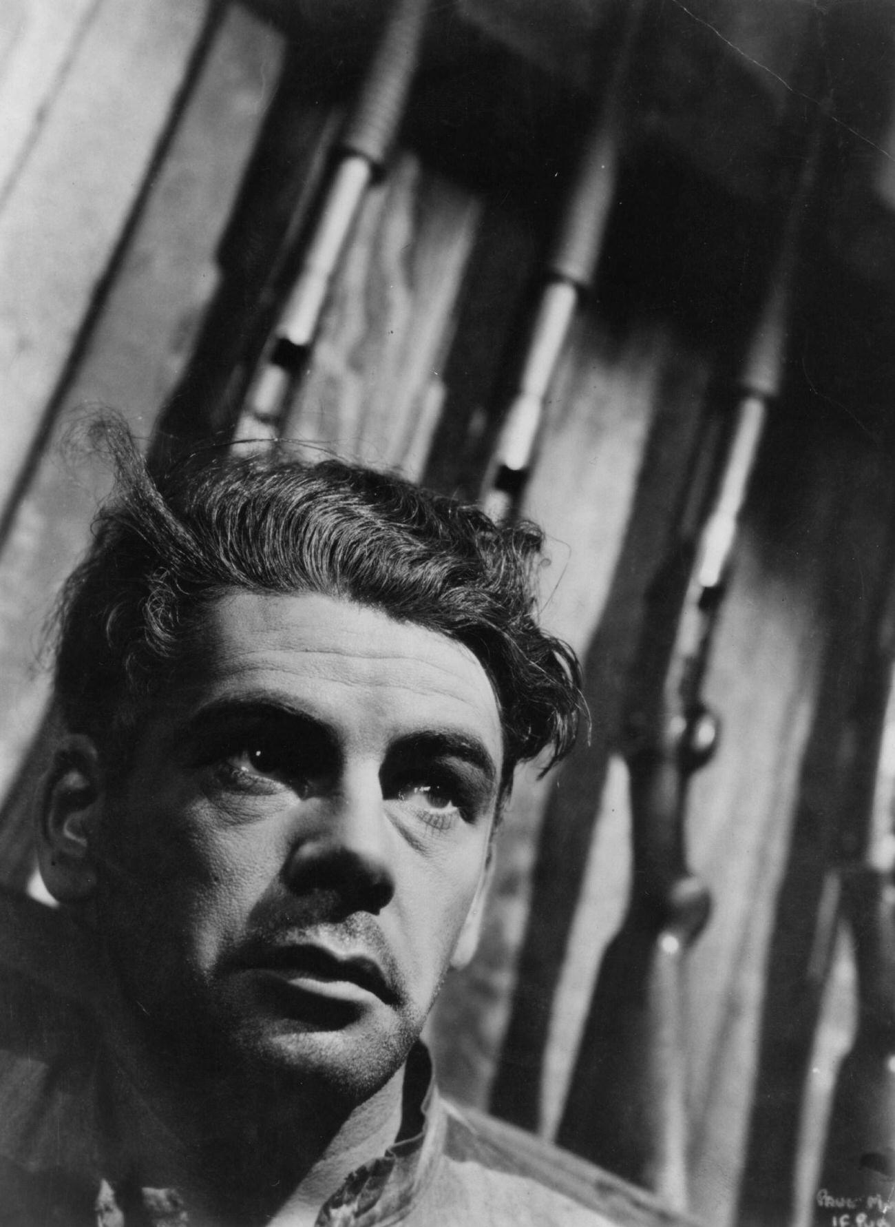 Paul Muni Standing Against Rifles In 'I Am A Fugitive From A Chain Gang', 1932.