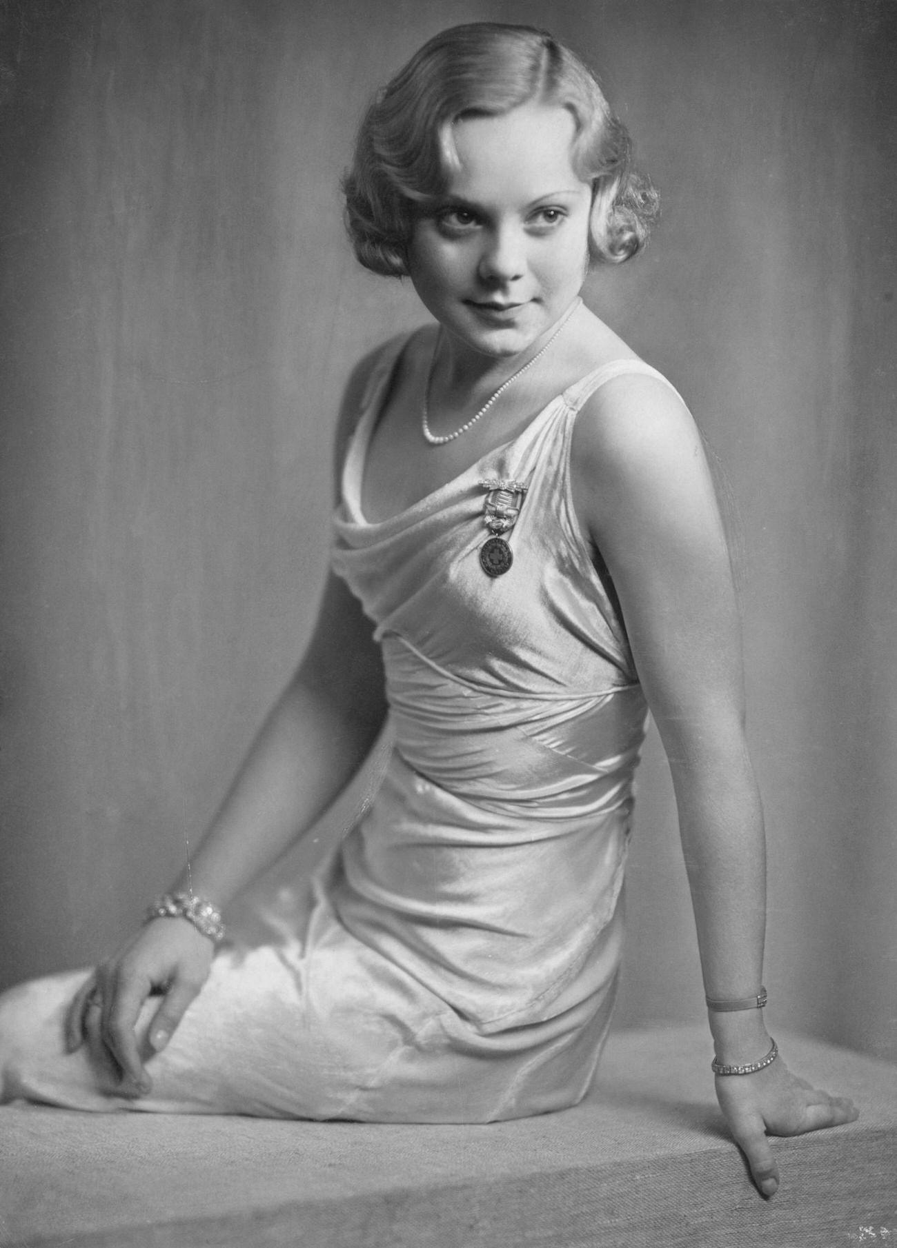 Sonja Henie Leaning On Her Left Arm In A Studio Portrait, Circa 1935.