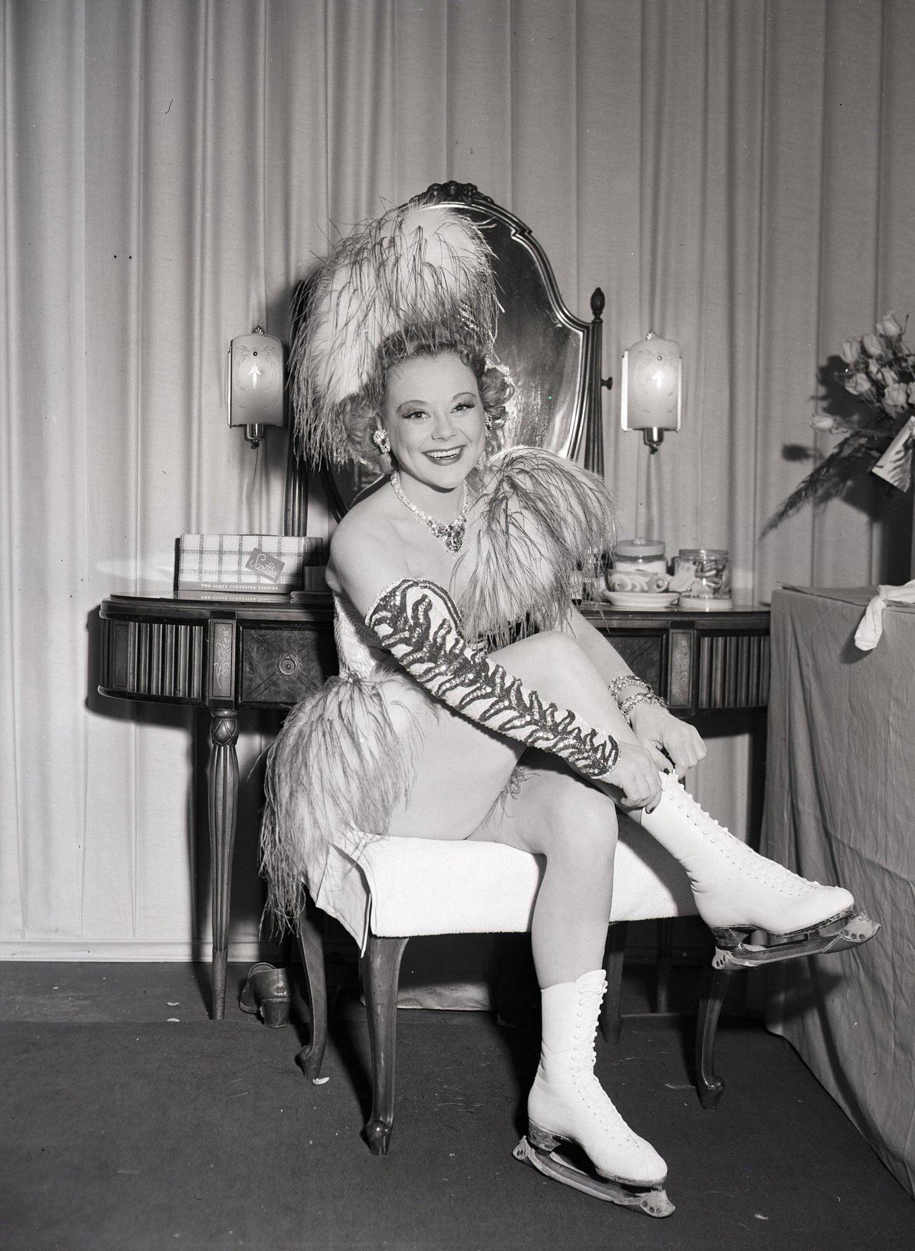 Sonja Henie Adjusting Her Skates Before The Opening Of Her 1948 Hollywood Ice Revue.