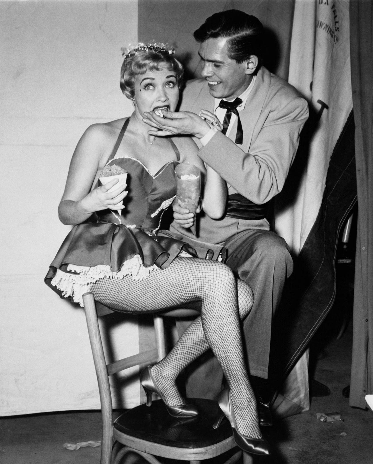 Jane Powell And Johnnie Ray Try Popcorn At A Party Thrown By Sonja Henie, Circa 1950.