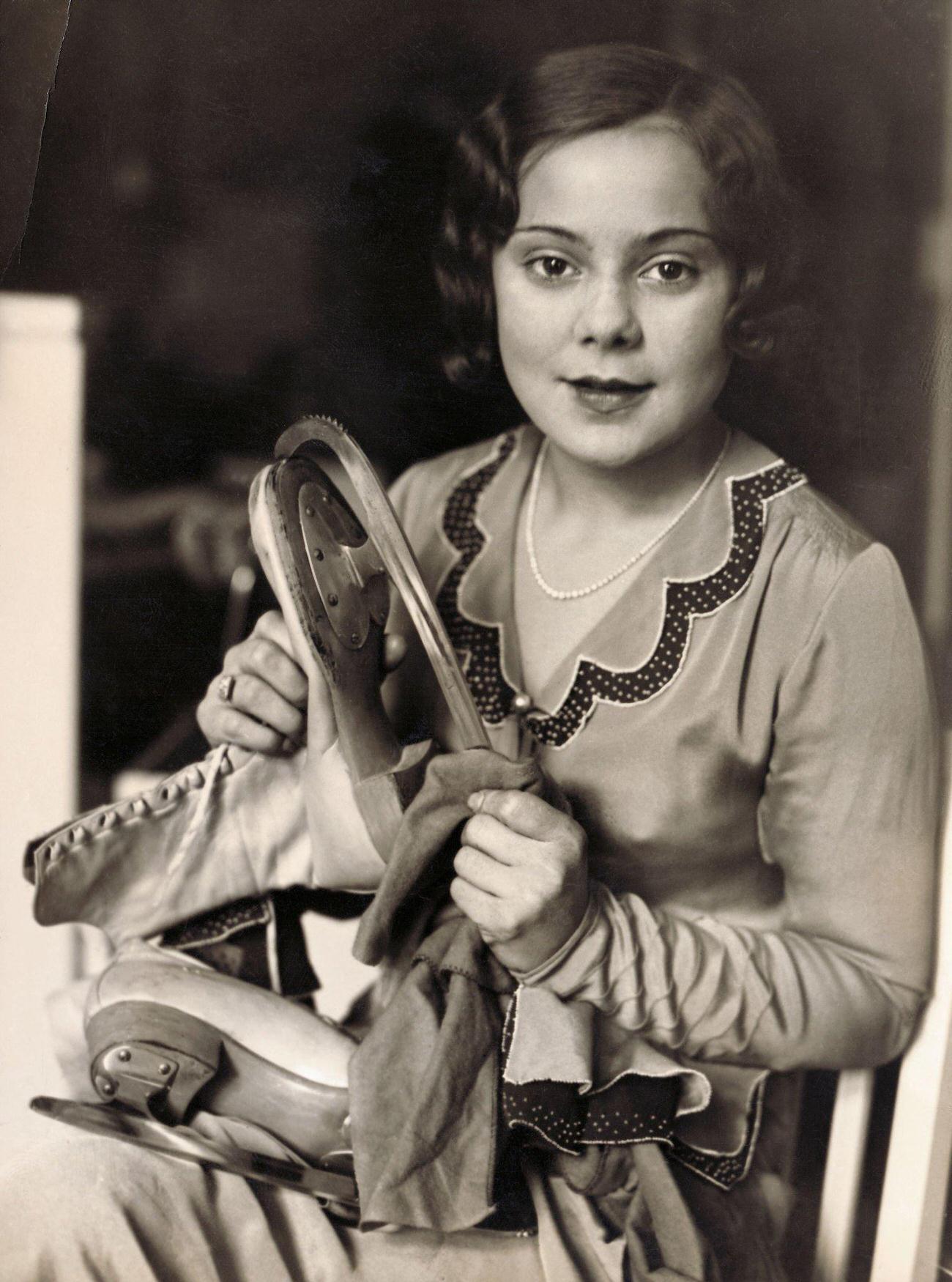 Sonja Henie, Holding Ice Skates.