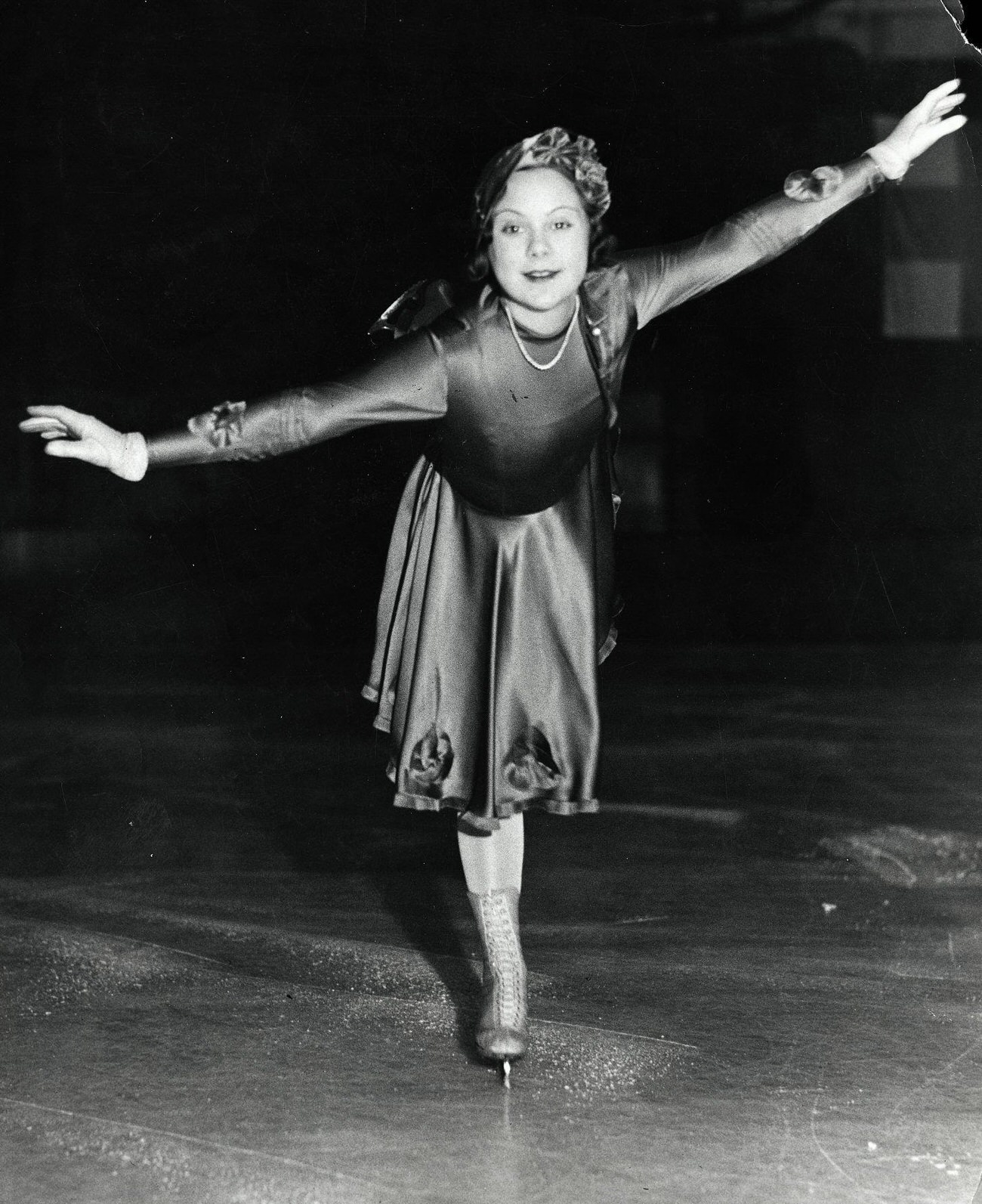 Sonja Henie, 15-Year-Old Ice-Skating Champion, In An Ice-Skating Pose.