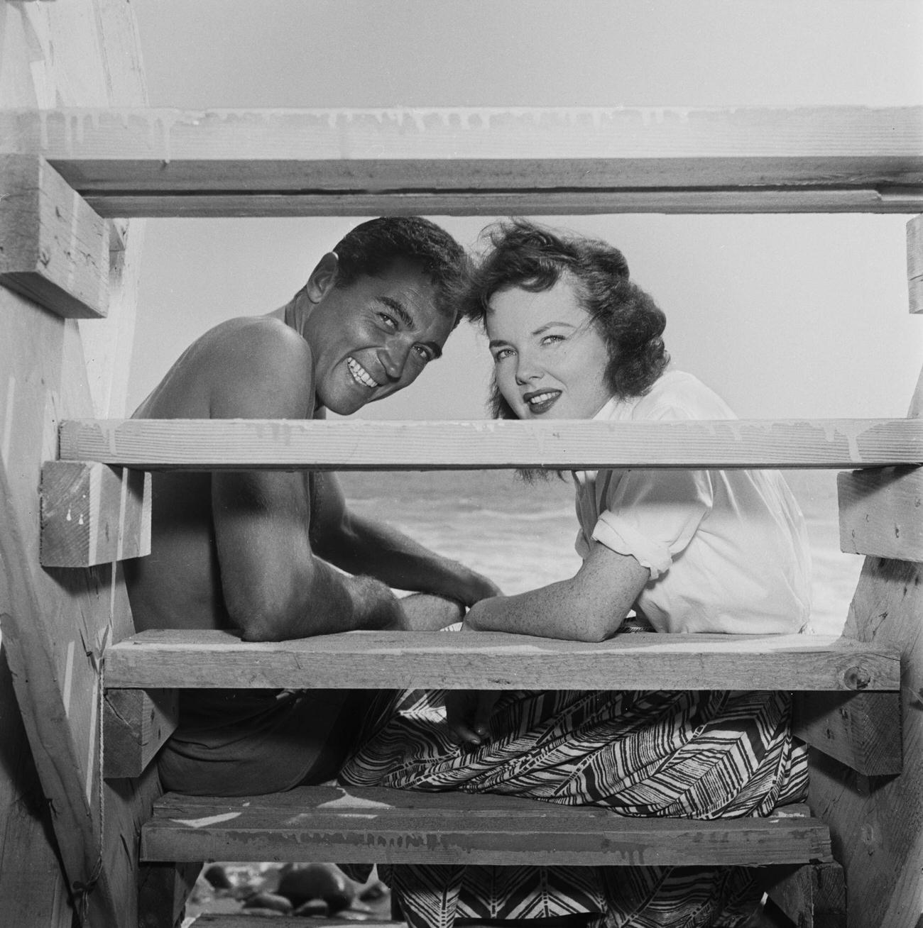 William Bishop And Wanda Hendrix Smiling Through Wooden Steps, United States, Circa 1950, 1950.