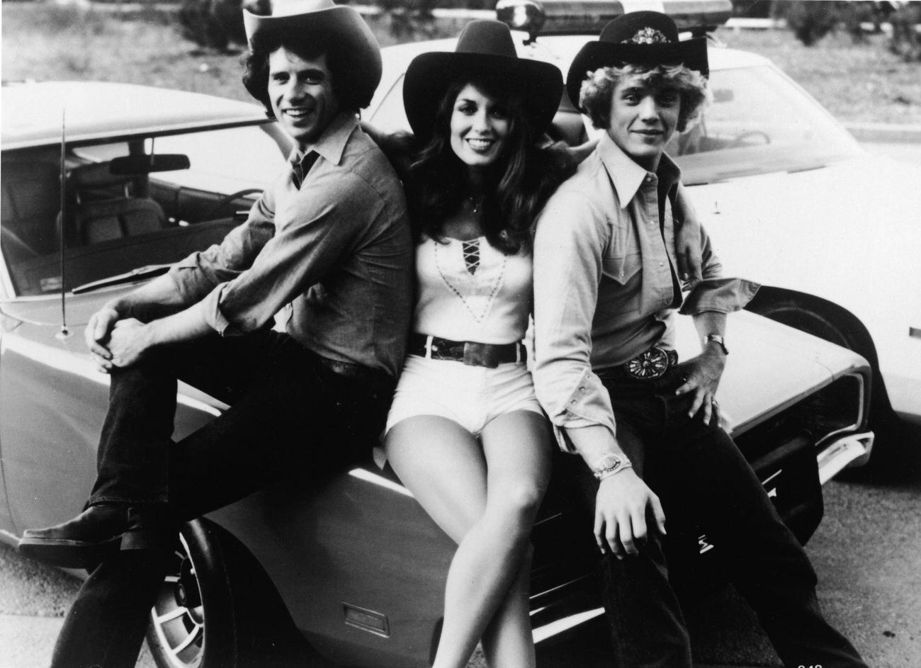 Cast Of 'The Dukes Of Hazzard' With Tom Wopat, Catherine Bach, And John Schneider, Circa 1980.
