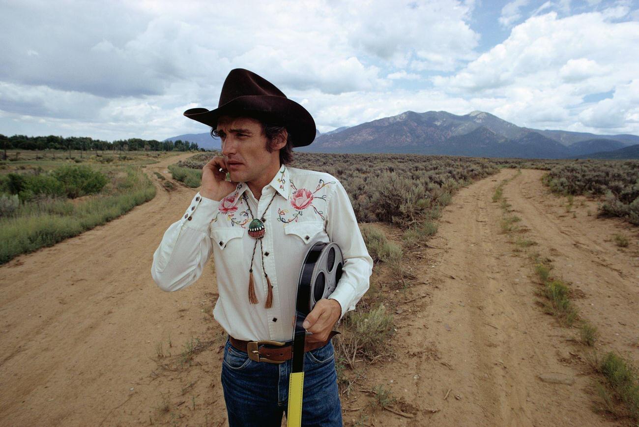 Dennis Hopper At A Desert Crossroads In New Mexico.