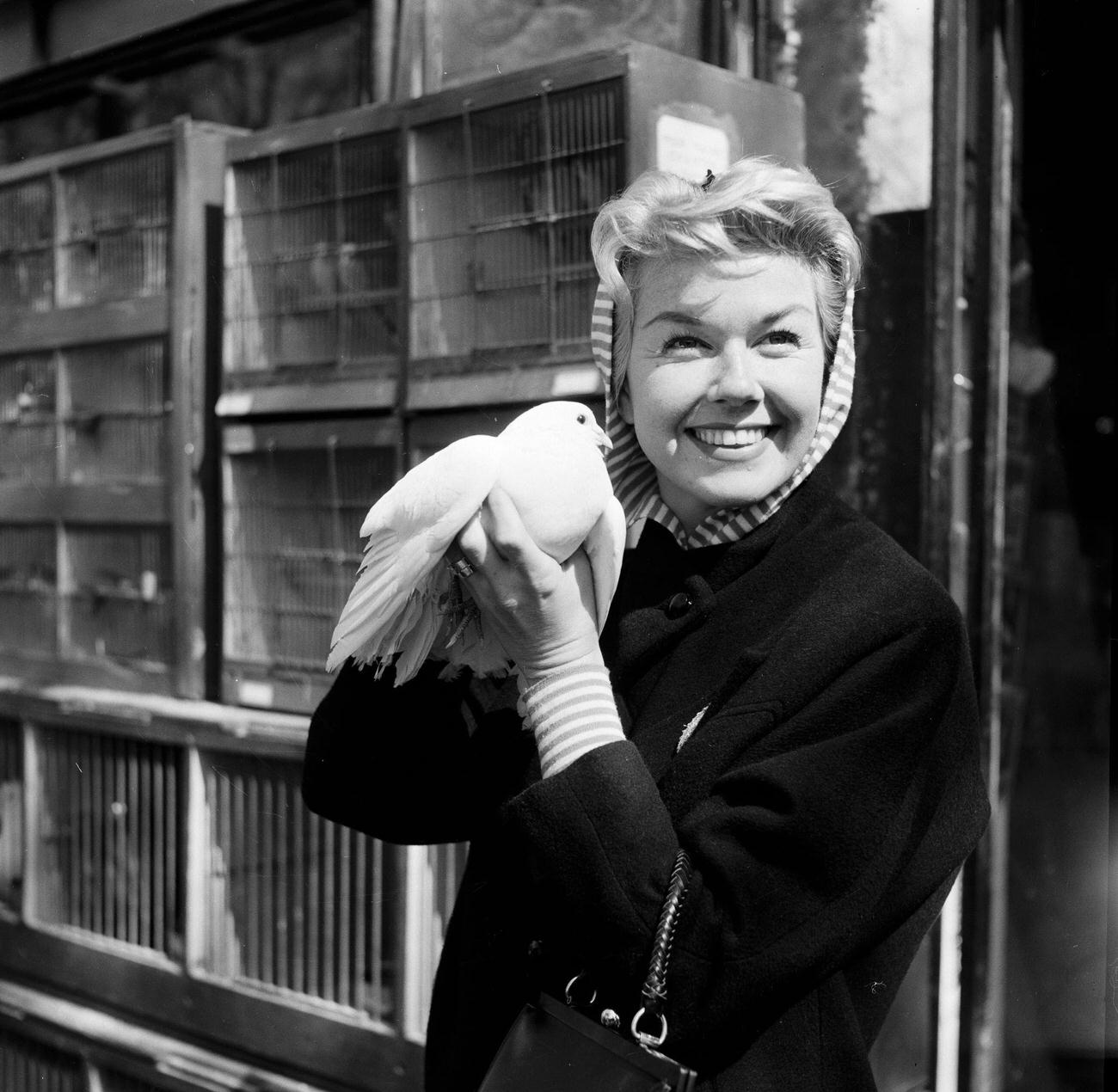 Doris Day Holding A Dove In Paris, April 1955.