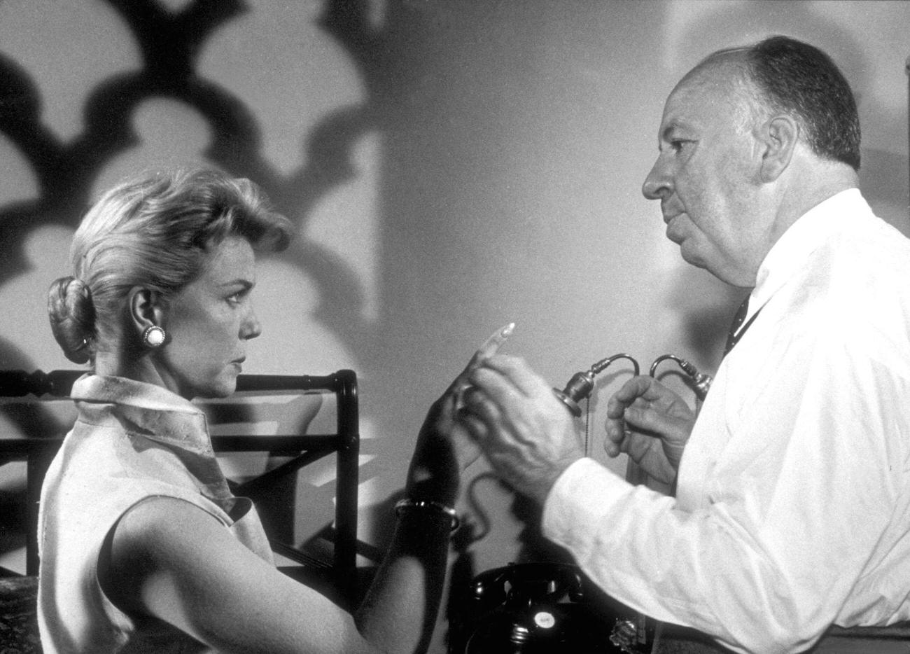 Doris Day With Alfred Hitchcock On The Set Of 'The Man Who Knew Too Much'.