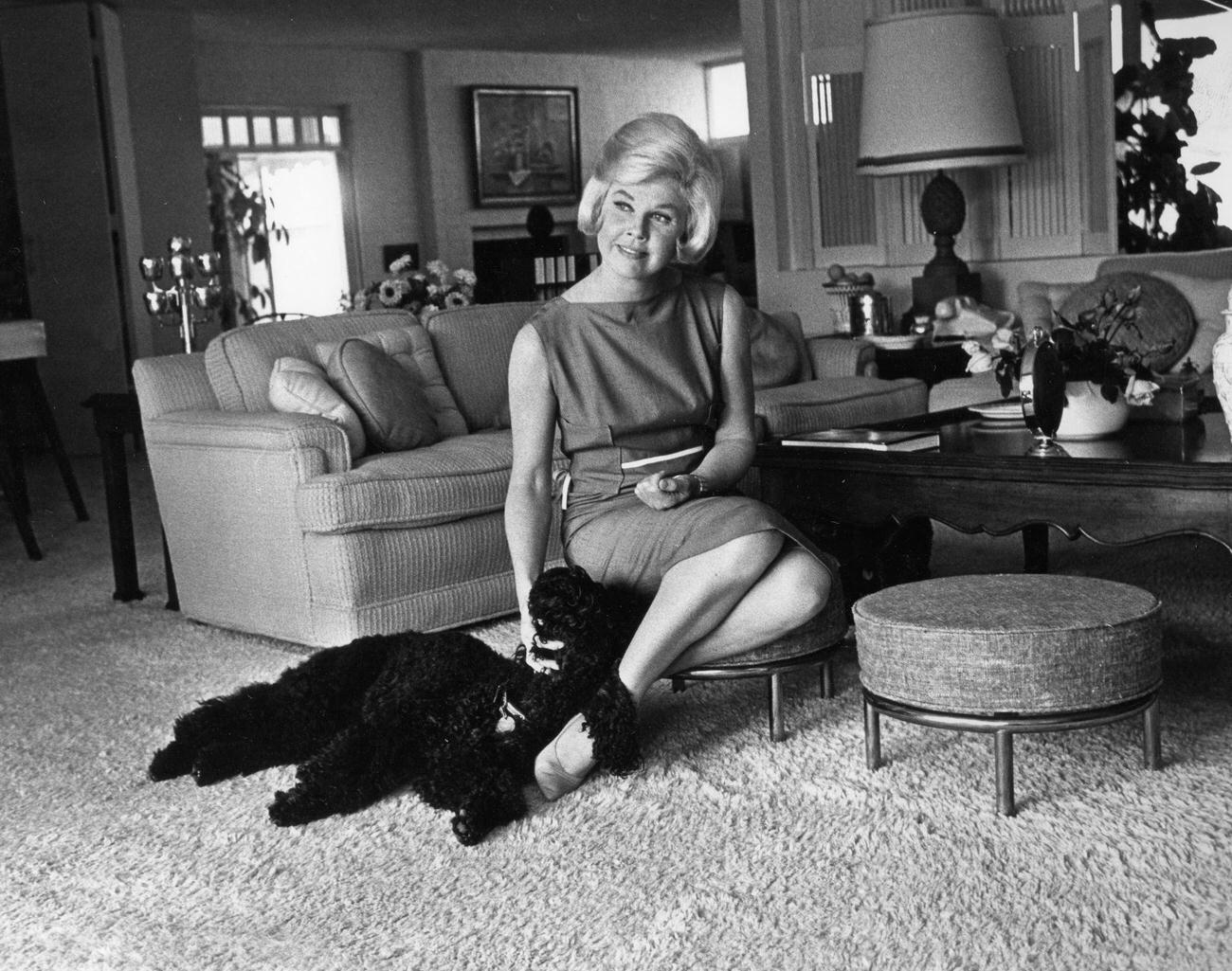 Doris Day Petting Her Dog At Her House In Los Angeles, 1960.
