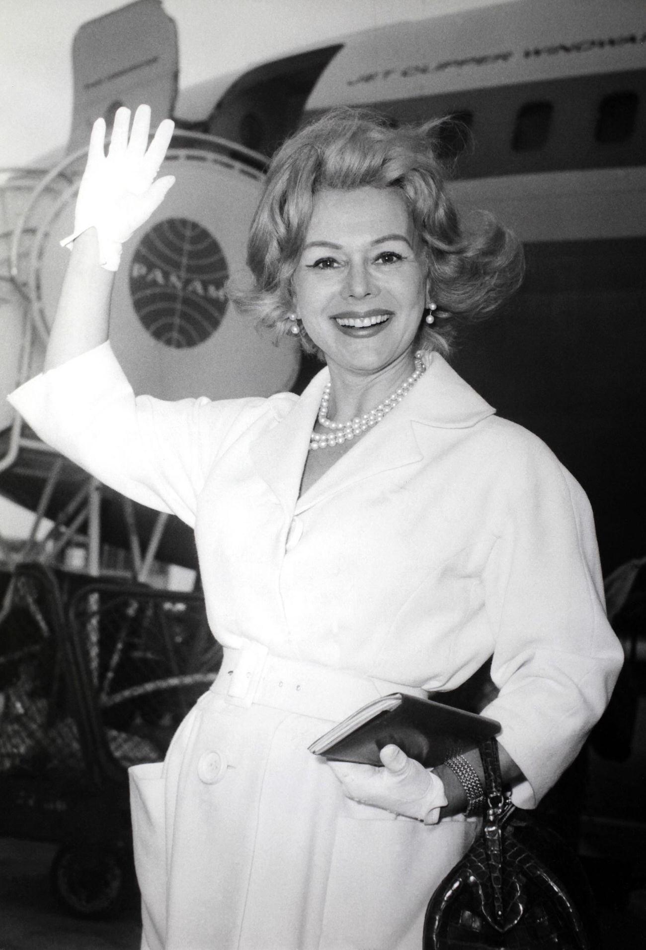 Eva Gabor Arrives In Paris With Husband Richard Brown, May 30, 1960.