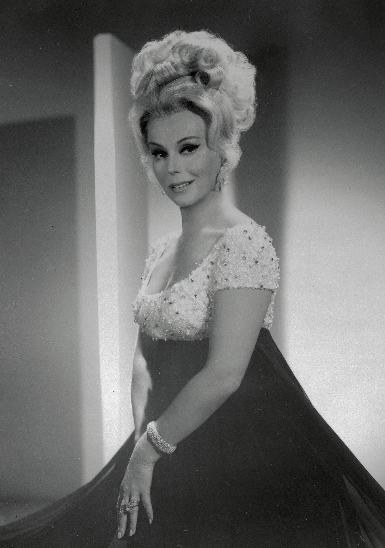Eva Gabor Posing In A Dress.
