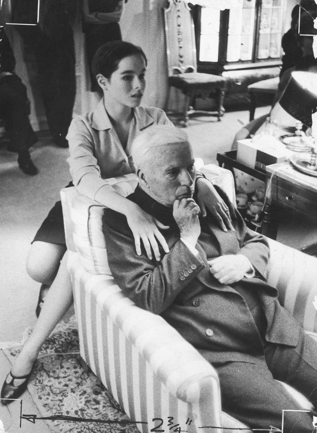Charlie Chaplin With His Daughter Geraldine On His 70Th Birthday At The Manoir De Ban, Switzerland, 1959.