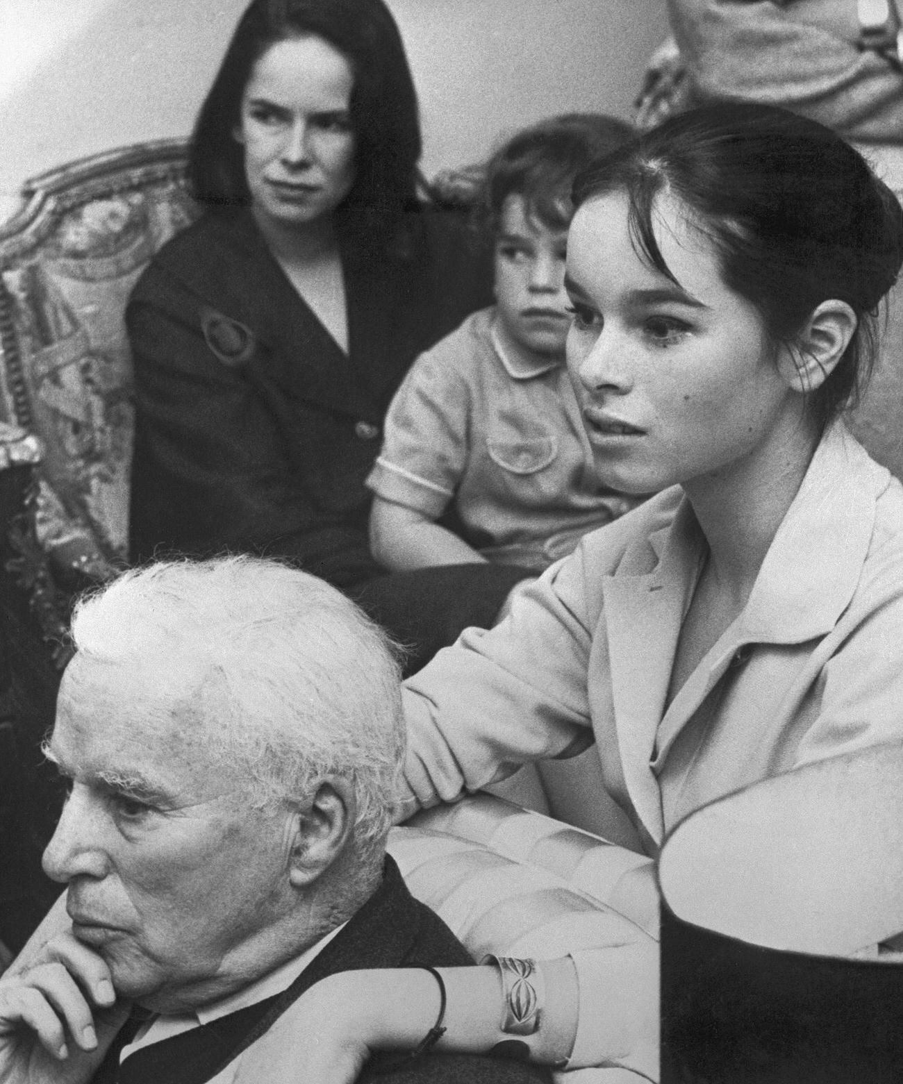 Charles Chaplin With His Daughter Geraldine, Wife Oona, And Son Eugene Celebrating His 70Th Birthday, 1959.