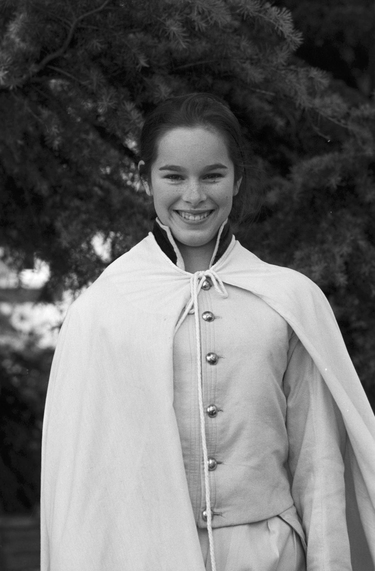 Geraldine Chaplin At 15, Posing In A Military Parade Costume In A Garden In Lausanne, Switzerland, 1959.