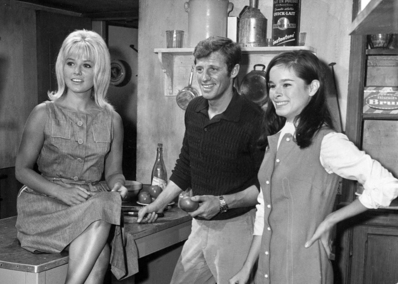 Sophie Daumier, Jean-Paul Belmondo, And Geraldine Chaplin During The Filming Of &Amp;Quot;Par Un Beau Matin D'Ete&Amp;Quot; In Nice, France, October 28, 1964.