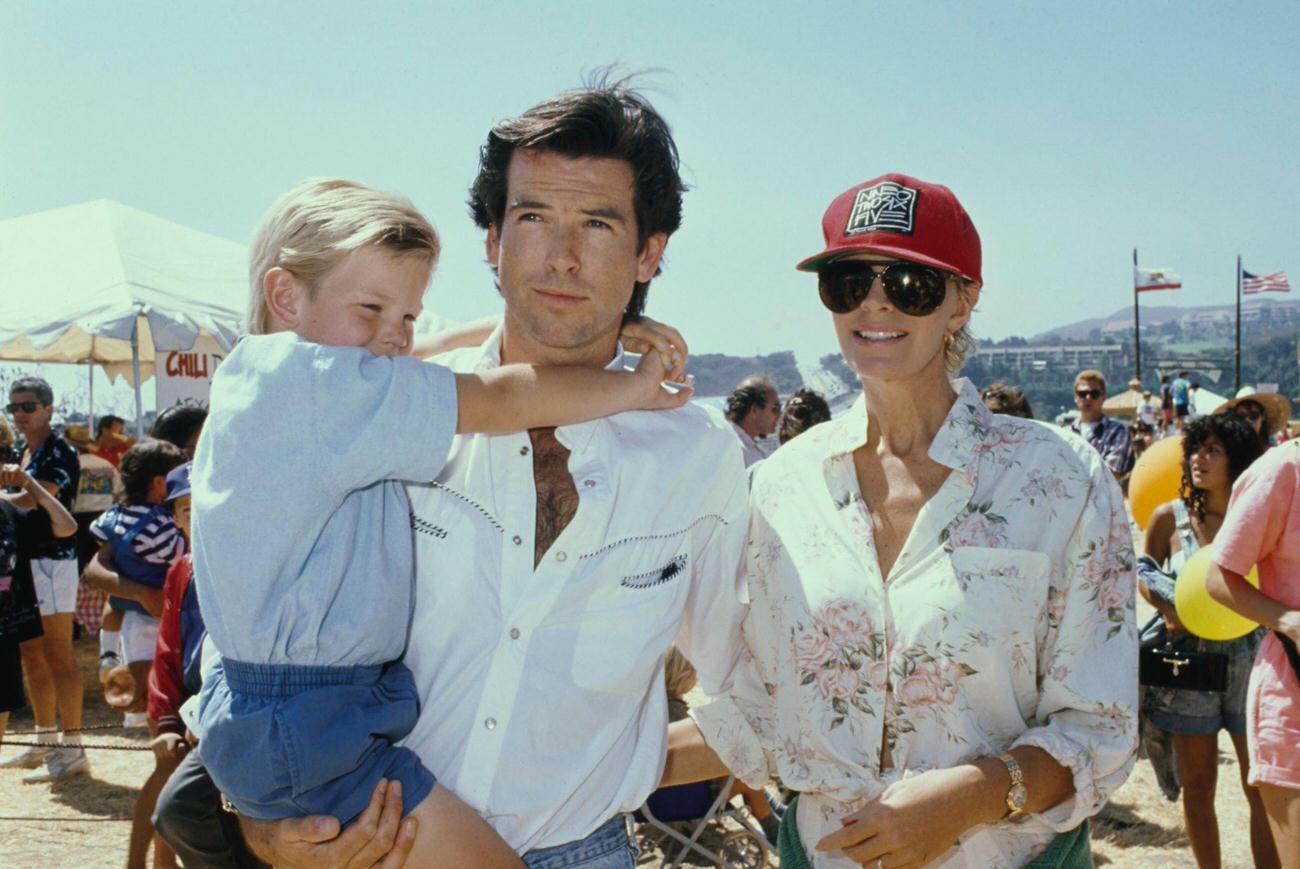 Pierce Brosnan With His Son Sean And Wife Cassandra At Malibu Kiwanis Chili Cook-Off, September 2, 1989.
