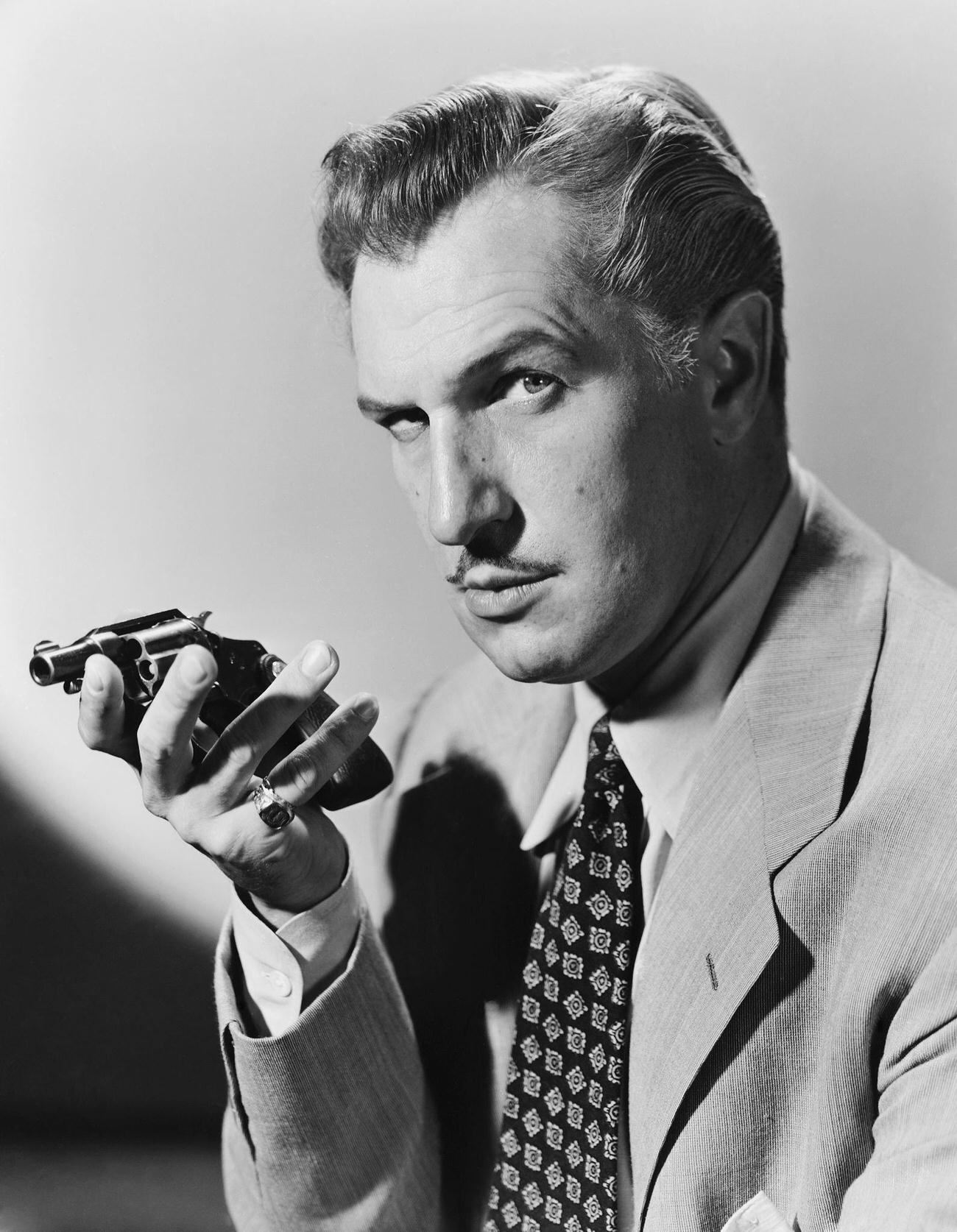 Vincent Price Holding A Revolver.