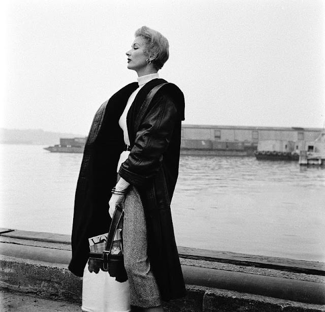 Lisa Fonssagrives In Turtleneck Under Leather Coat By Bonnie Cashin, Cowhide Bag By Mark Cross, 1953.