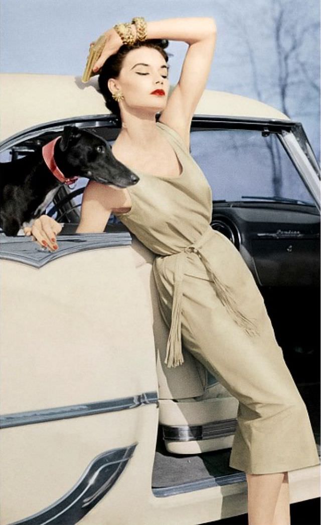 Model In Kidskin Sheath Dress With Fringed Belt By Bonnie Cashin, 1954.