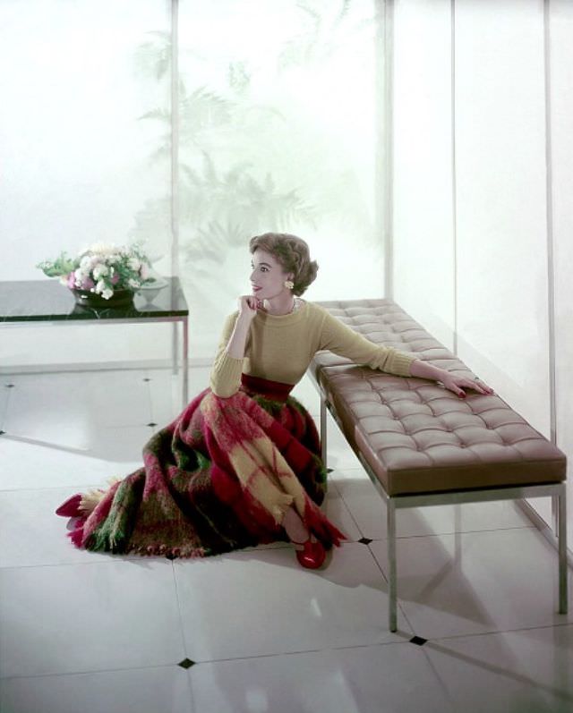 Model In Mohair Blanket Skirt By Bonnie Cashin, Wool Sweater By Geist &Amp;Amp; Geist, Red Satin Shoes By Deliso Debs, 1957.