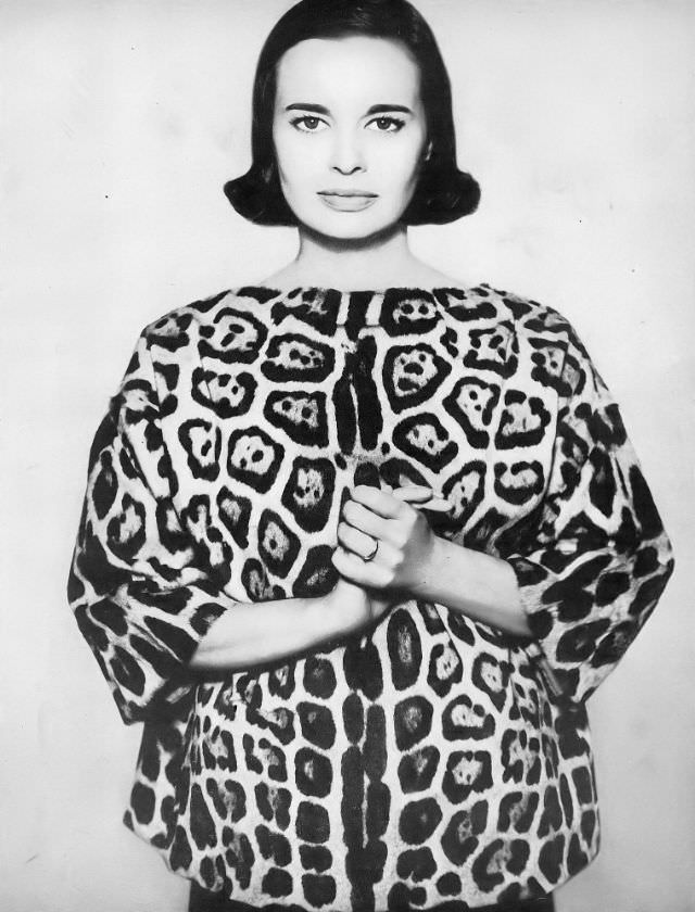 Gloria Vanderbilt In Ocelot Fur Jacket Lined In Red Wool Jersey By Bonnie Cashin, December 1959.