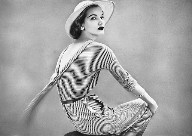 Sunny Harnett In Navy Blue And White Striped Jersey Dress By Bonnie Cashin, Straw Hat By Stetson, February 1951.