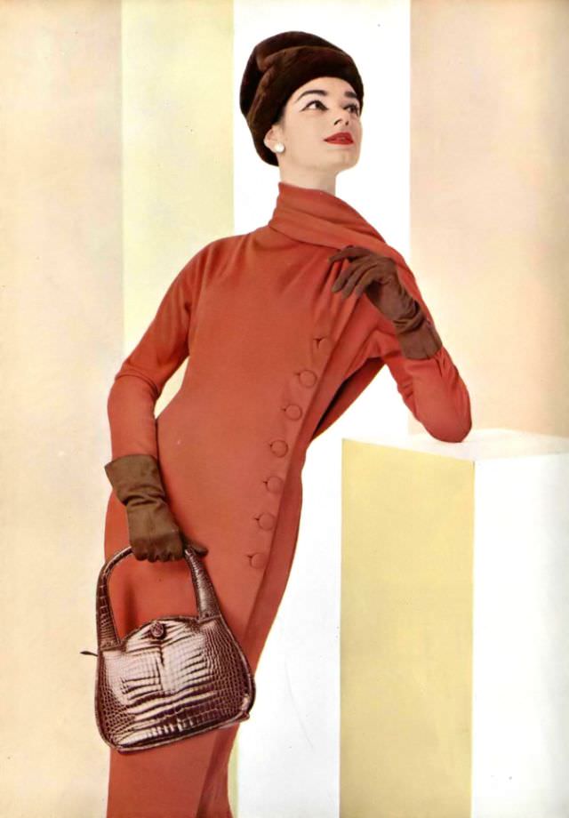 Jacky Mazel In Brick Red Jersey Sheath By Jacques Fath, 1956.