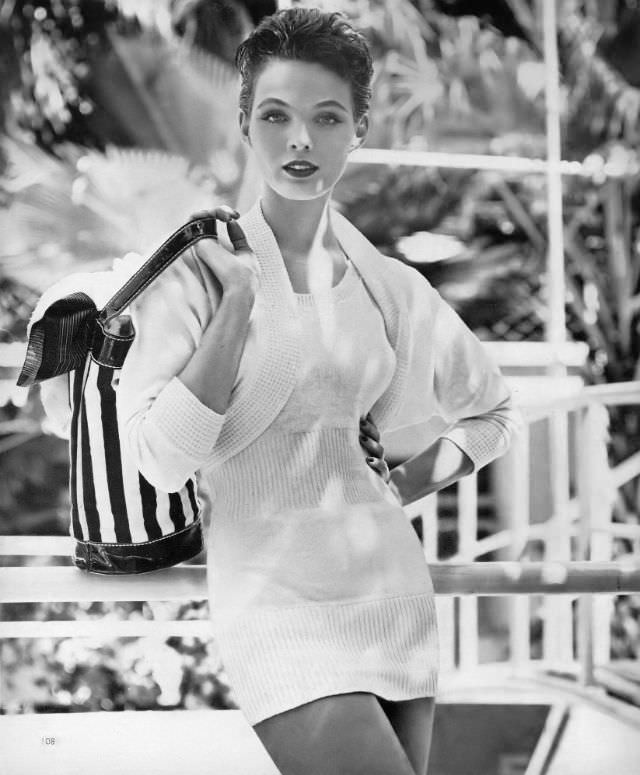 Linda Harper In A Chalk-White Sunsuit With A Pink Jersey-Lined Jacket By Mabs Barnes, 1954.