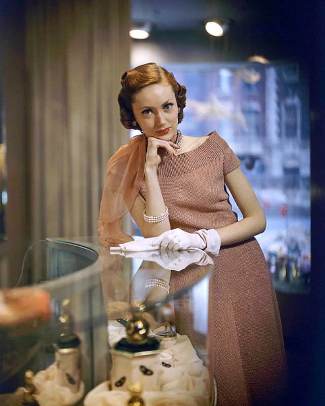 Model In Rosy Knit Dress By Pauline Trigere, 1948.