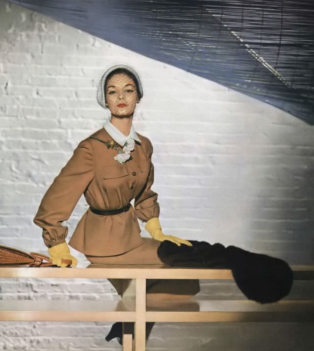 Jean Patchett In Harry Frechtel Worsted Suit, Sally Victor Hat, Vogue, February 15, 1950.