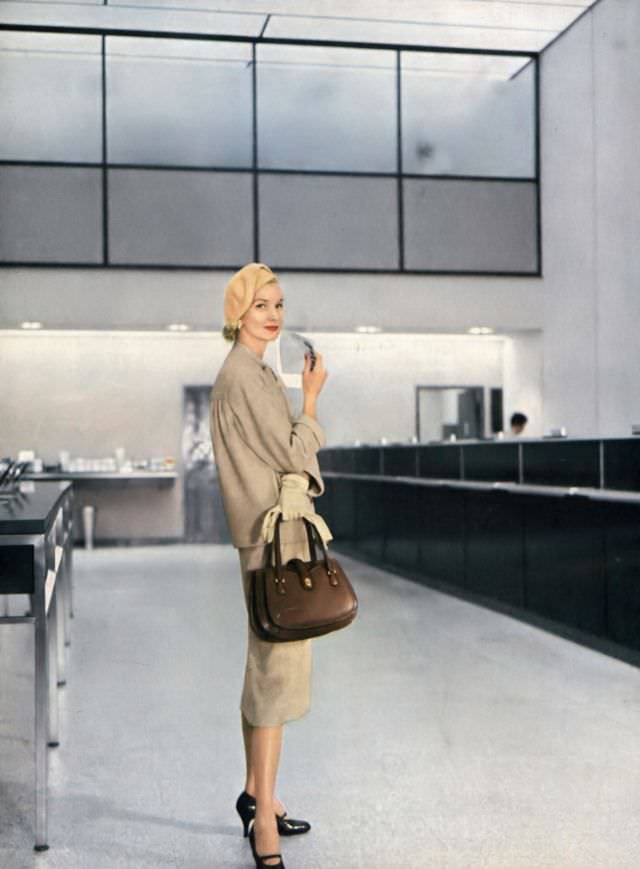 Sunny Harnett In Zelinka-Matlick Wool Tweed Suit, Sally Victor Beret, Vogue, January 1956.