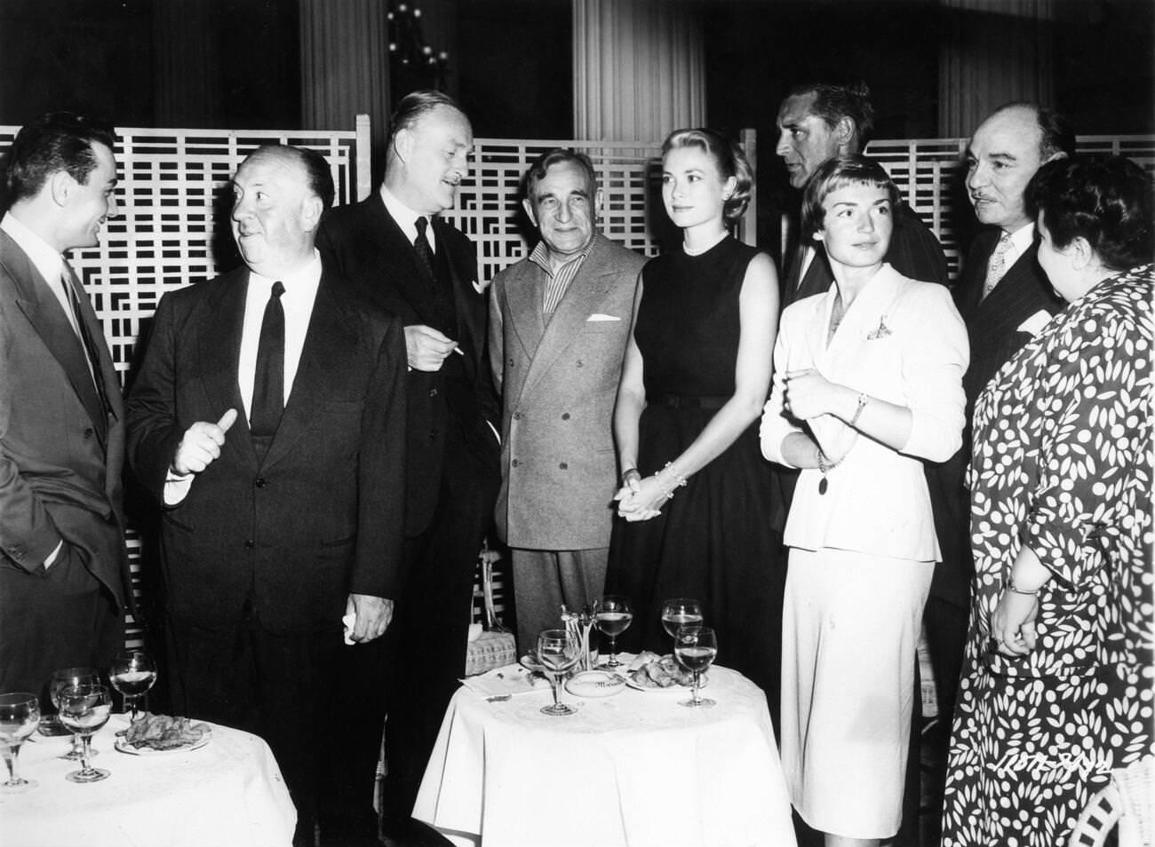 Press Reception At Cannes, France, For &Amp;Quot;To Catch A Thief&Amp;Quot; With Roland Lesaffre, Alfred Hitchcock, John Williams, Charles Vanel, Grace Kelly, Cary Grant, Brigitte Auber, Rene Blancard, And Georgette Anys, 1955.