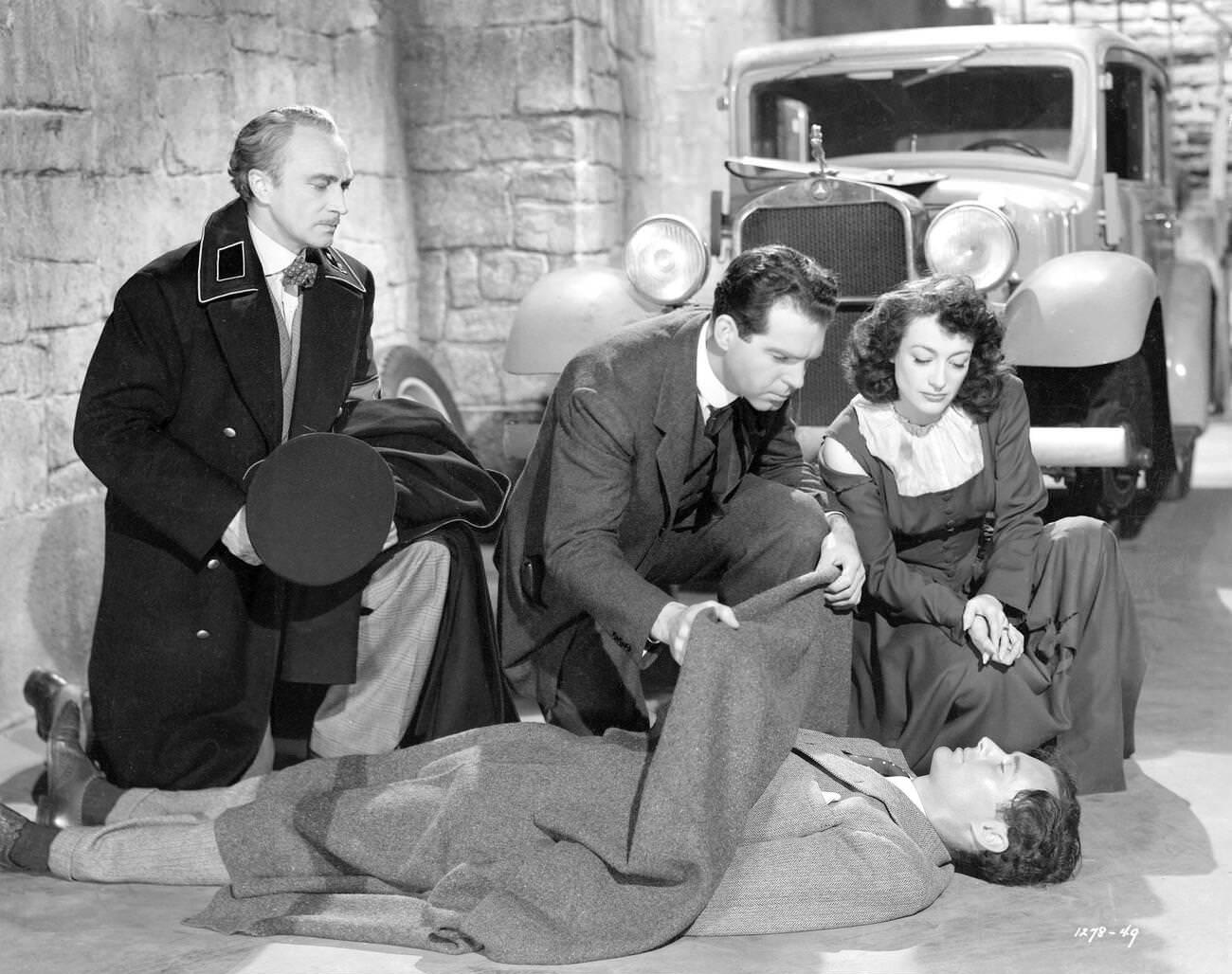 Basil Rathbone, Fred Macmurray, And Joan Crawford In Above Suspicion, Released 1943.