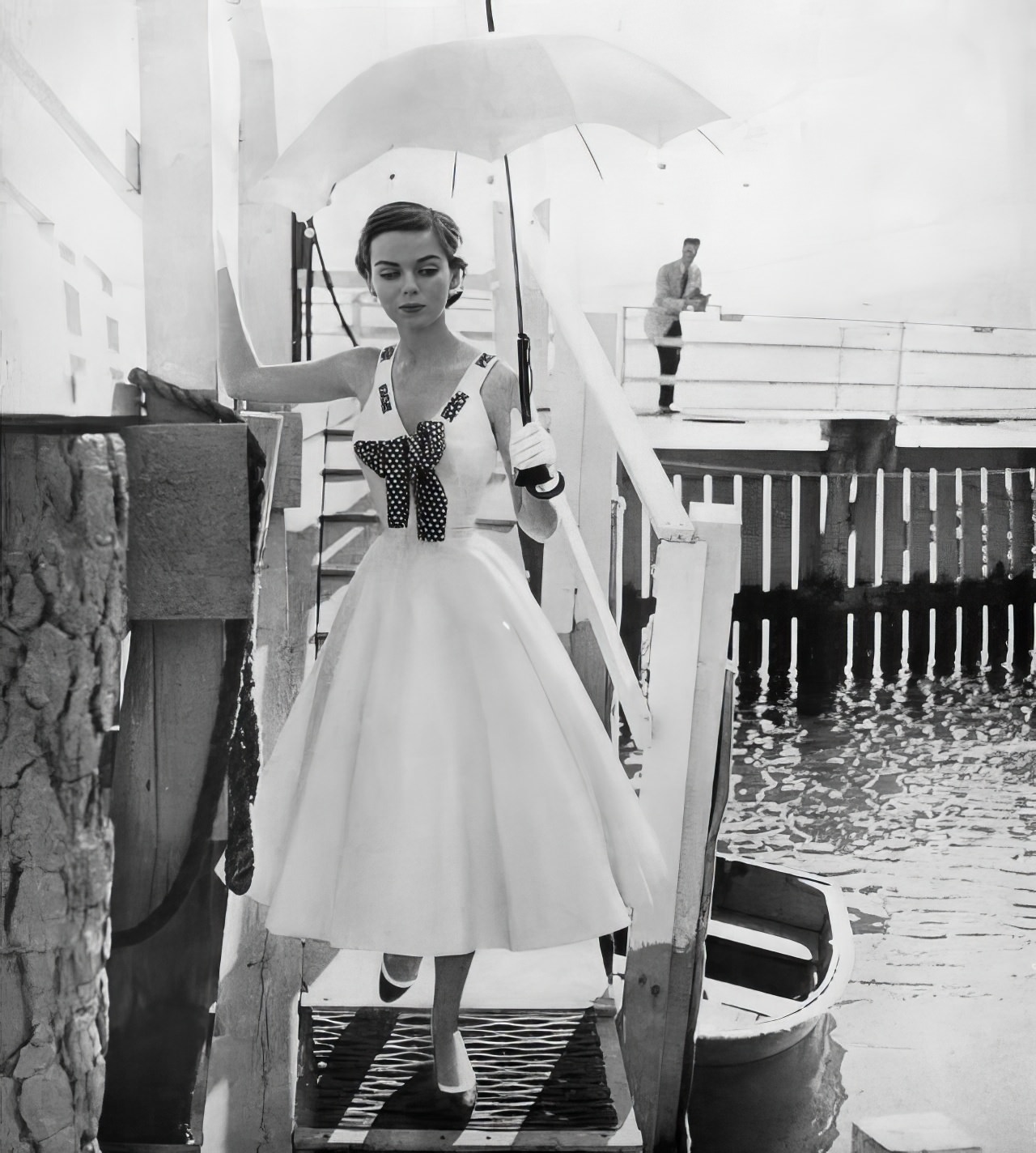 Sandy Brown In A White Piqué Halter Dress By Anne Fogarty, Harper'S Bazaar, January 1955.