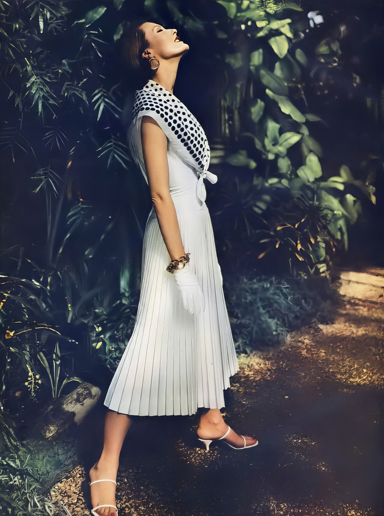 Mary Jane Russell In A White Pleated Dress By Anne Fogarty, Vogue, May 15, 1956.