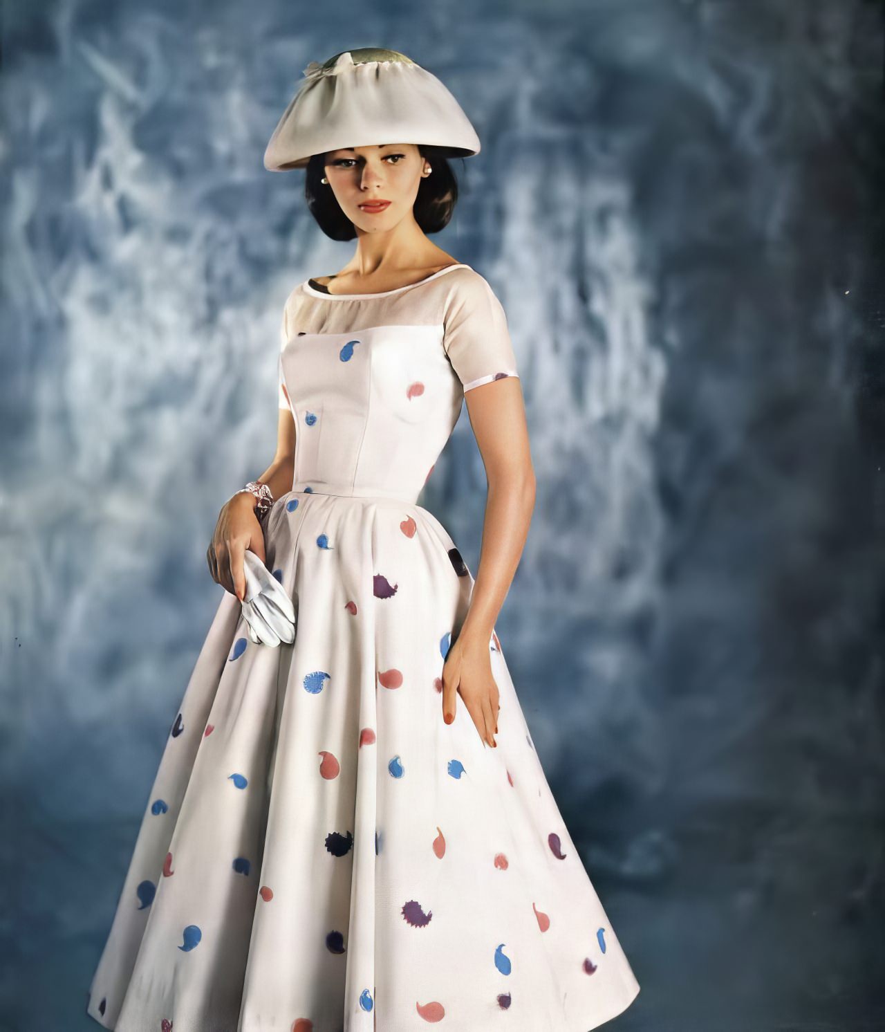 Sandy Brown In A Bates Cotton Dress By Anne Fogarty, Vogue, April 15, 1957.