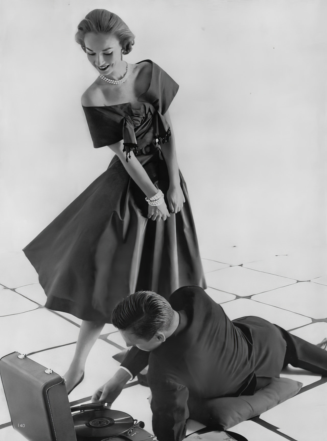Janet Randy In A Red Rayon Taffeta Dress By Anne Fogarty, Vogue, September 15, 1951.