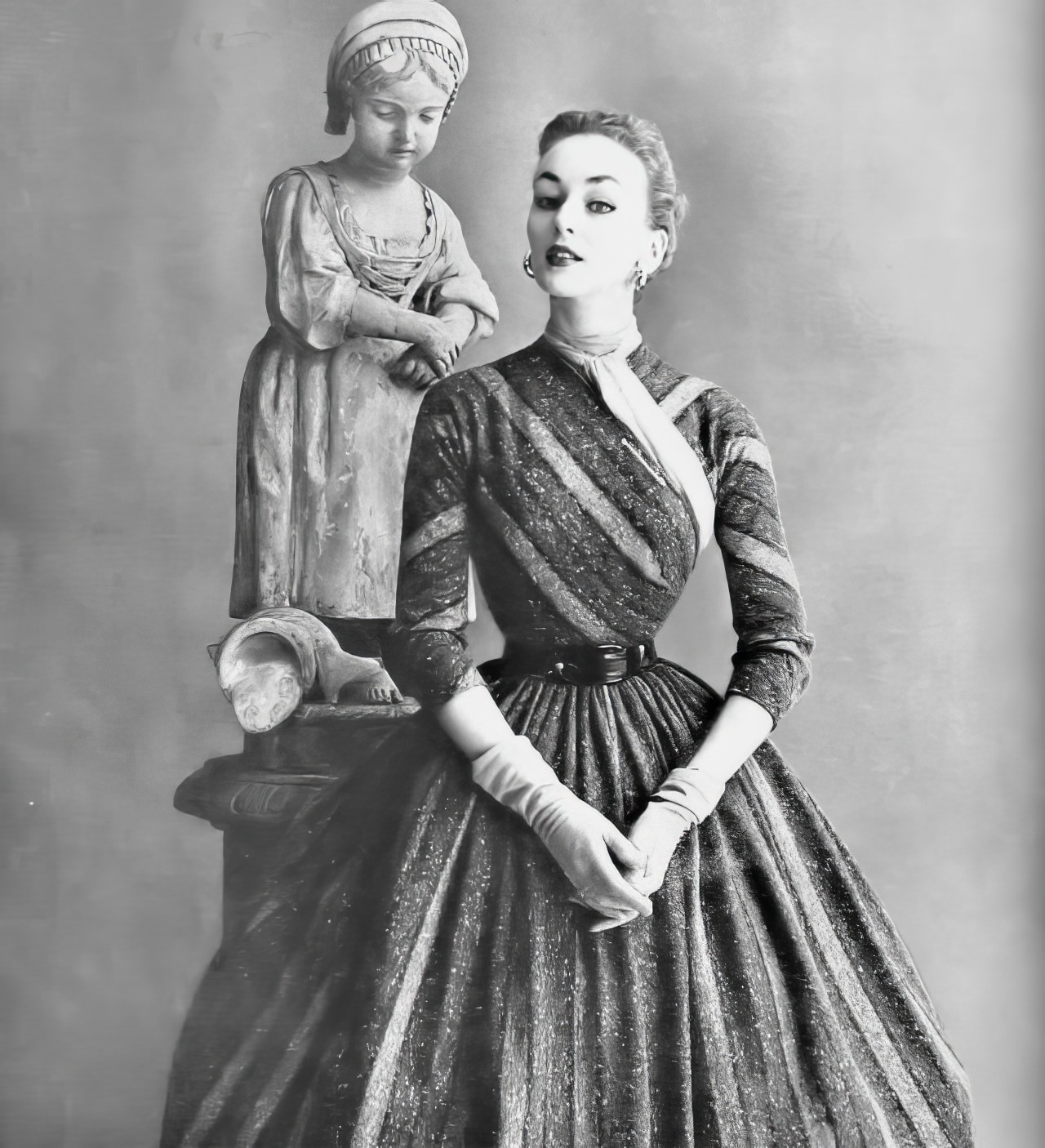 A Model In A Striped Dress With A Full Skirt By Anne Fogarty, Vogue, August 15, 1952.