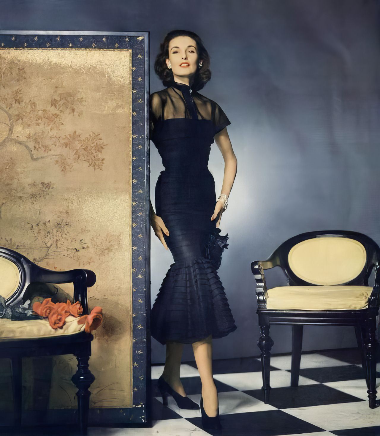 Elise Daniels In A Marquisette And Enka Rayon Dress By Earl Luick For Anna Miller, Vogue, March 15, 1951.