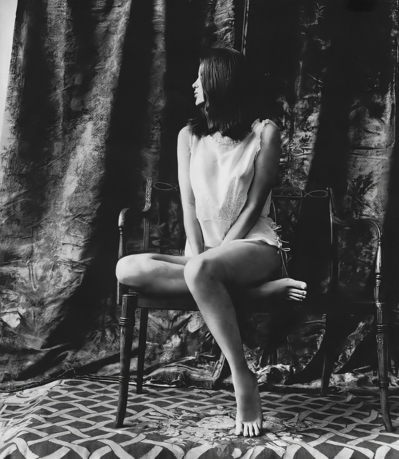 Donna Mitchell In A White Tunic With Blue Bows By Iris, Vogue, February 1, 1965.