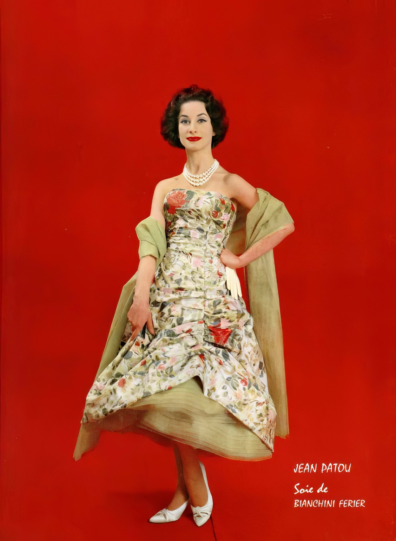 A Model In A Short Floral Silk Dress By Jean Patou, 1958.