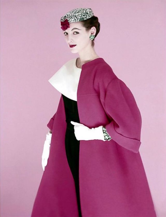 Joan Romano Is Wearing A Printed Linen Turban And A Full Red Fleece Coat By Originala Over A Navy Dress With A Large Collar In White Pique By Larry Aldrich, Photo By Richard Rutledge, 1954