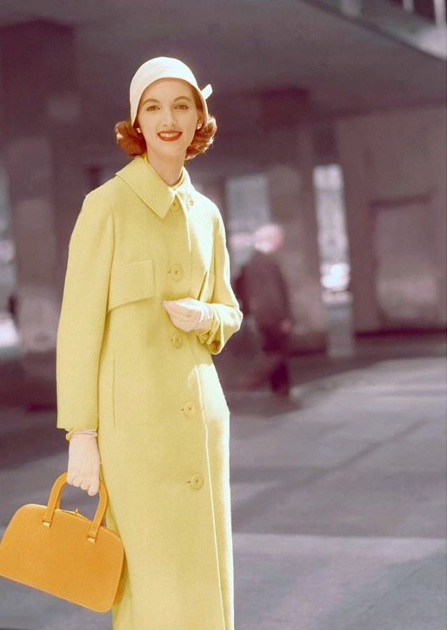 Joan Romano In A Yellow Wool Coat By Swansdown, Cloche By John Frederics Charmer, Gloves By Kislav, Bag By J. Mas, Photo By Leombruno-Bodi, 1955