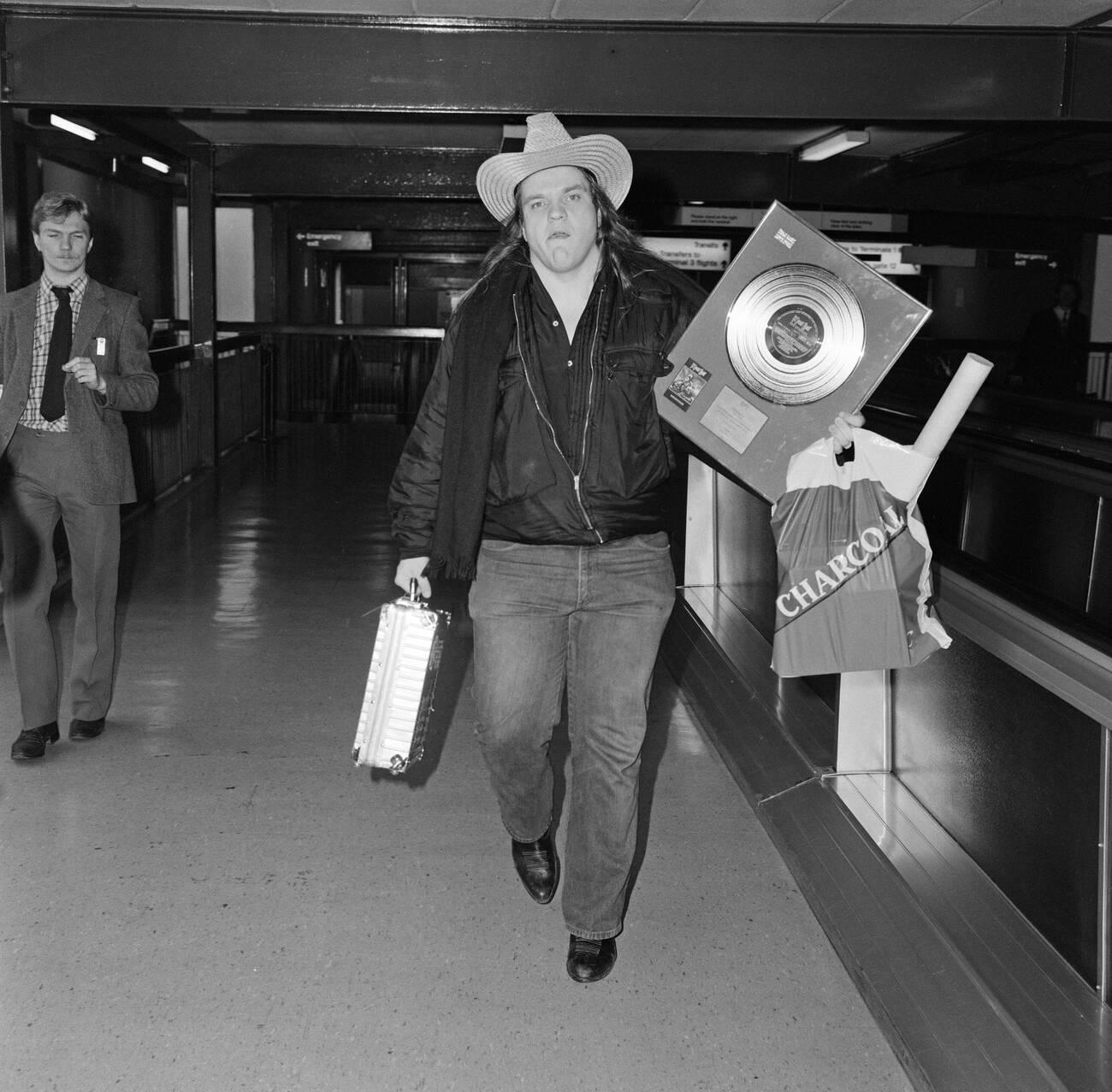 Meat Loaf Leaving Heathrow Airport For New York After A Tour, 1985.